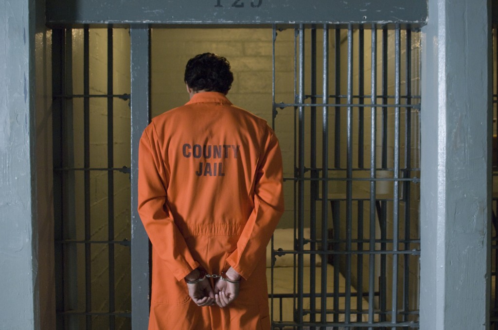 Man In Prison - iStock_000059585366_Medium